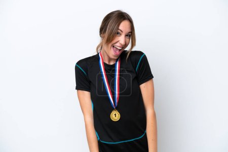 Photo for Young caucasian woman with medals isolated on white background with surprise facial expression - Royalty Free Image