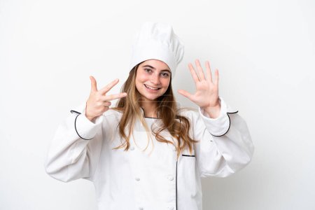 Photo for Young caucasian chef woman isolated on white background counting eight with fingers - Royalty Free Image