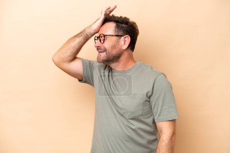 Photo for Middle age caucasian man isolated on beige background has realized something and intending the solution - Royalty Free Image