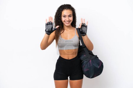 Photo for Young sport Arab woman with sport bag isolated on white background counting eight with fingers - Royalty Free Image