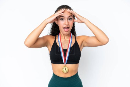 Photo for Young sport woman with medals isolated on white background with surprise expression - Royalty Free Image