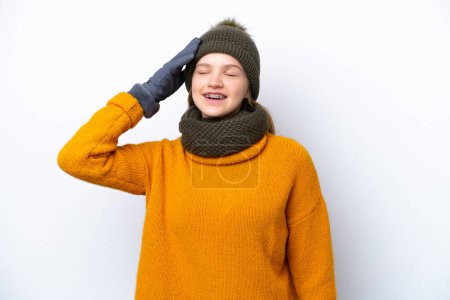 Téléchargez les photos : Adolescente fille russe portant veste d'hiver isolé sur fond blanc a réalisé quelque chose et l'intention de la solution - en image libre de droit
