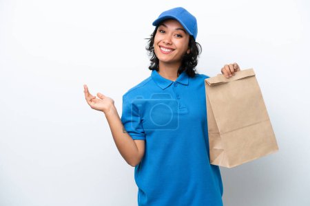 Photo for Woman with delivery bag isolated on white background with surprise facial expression - Royalty Free Image