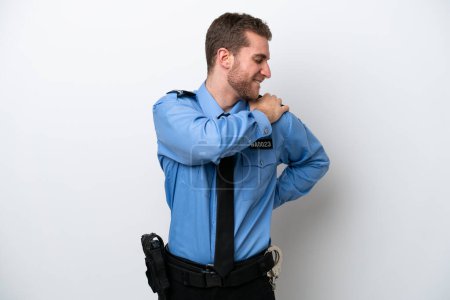 Téléchargez les photos : Young police caucasian man isolated on white background suffering from pain in shoulder for having made an effort - en image libre de droit