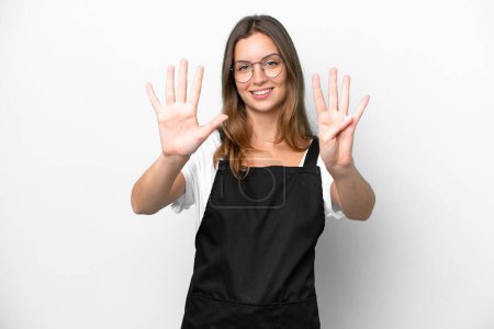 Photo for Young caucasian restaurant waiter woman isolated on white background counting nine with fingers - Royalty Free Image