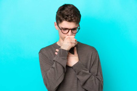 Photo for Teenager Russian man isolated on blue background coughing a lot - Royalty Free Image