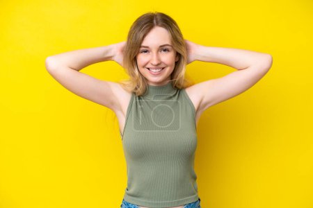 Photo for Blonde English young girl isolated on yellow background laughing - Royalty Free Image
