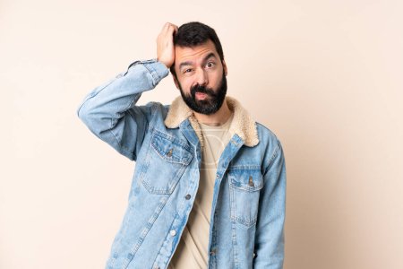 Photo for Caucasian man with beard over isolated background with an expression of frustration and not understanding - Royalty Free Image