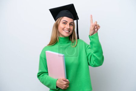 Photo for Young university graduate woman isolated on white background pointing up a great idea - Royalty Free Image