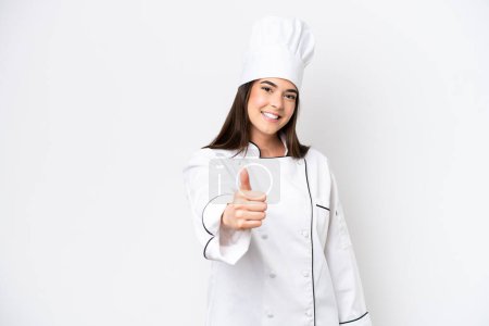 Photo for Young Brazilian chef woman isolated on white background with thumbs up because something good has happened - Royalty Free Image