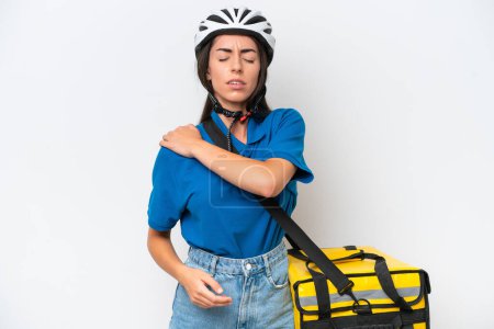 Téléchargez les photos : Young caucasian woman with thermal backpack isolated on white background suffering from pain in shoulder for having made an effort - en image libre de droit