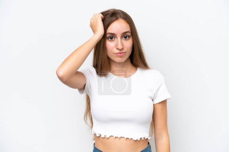 Young caucasian woman isolated on white background with an expression of frustration and not understanding