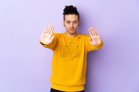 Photo for Caucasian man over isolated background making stop gesture and disappointed - Royalty Free Image