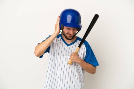 Photo for Young caucasian man playing baseball isolated on white background frustrated and covering ears - Royalty Free Image
