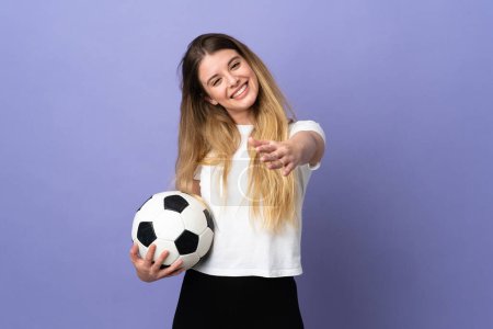 Photo for Young blonde football player woman isolated on purple background with surprise facial expression - Royalty Free Image
