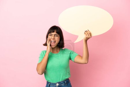 Photo for Youing woman holding an empty speech bubble and shouting - Royalty Free Image