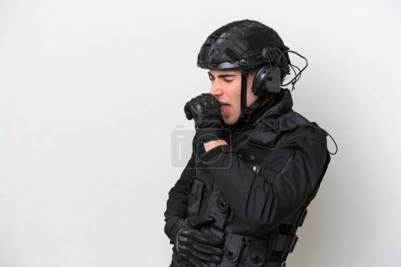 Foto de SWAT caucasian man isolated on white background is suffering with cough and feeling bad - Imagen libre de derechos