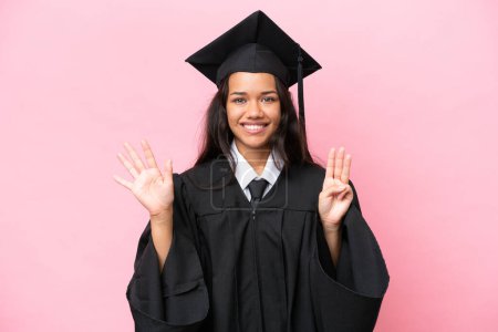 Photo for Young university Colombian woman graduate isolated on pink background counting eight with fingers - Royalty Free Image