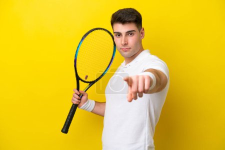 Photo for Young caucasian man isolated on white background playing tennis - Royalty Free Image