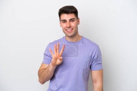 Photo for Young caucasian man isolated on white background happy and counting four with fingers - Royalty Free Image