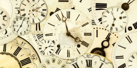 Photo for Retro styled image of a collection of vintage weathered clock faces - Royalty Free Image