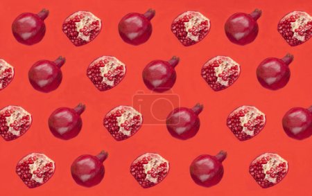 Photo for Pomegranate on the red background.Pattern. Flat lay. Top view. - Royalty Free Image