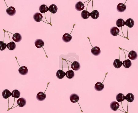 Photo for Red cherry on the pink background. Top view. Falt lay. Pattern. - Royalty Free Image