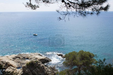 Beautiful view of the sea and boat on a summer day. Spain.