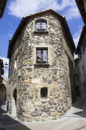 View of the house in the old town on a day. Location vertical. Castellfollit de la Roca. Spain.