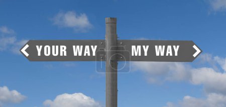 The words your way, my way on a road sign against the sky