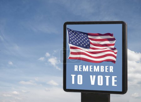 Foto de Cartelera con la inscripción "Recuerda votar", bandera estadounidense contra el cielo - Imagen libre de derechos