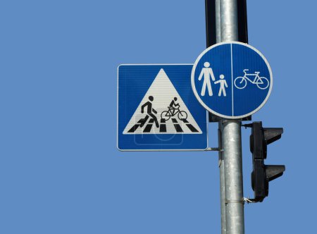 Photo for Pedestrian crossing sign for people and cyclists on sky background - Royalty Free Image