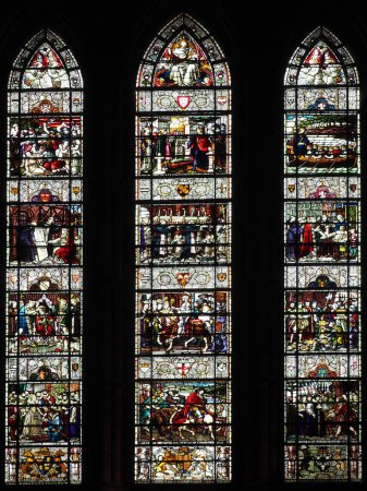 Photo for Chester. Cheshire, United Kingdom - 20 March 2024 : Stained glass west window showing scenes from the history of the church in St John the Baptist's Church, Chester. Created by Edward Frampton 1890 - Royalty Free Image