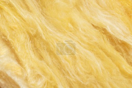 Photo for Yellow mineral wool with a visible texture - Royalty Free Image