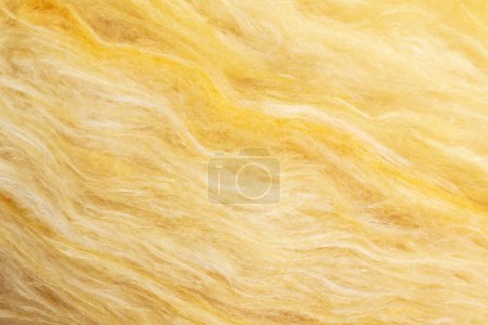 Téléchargez les photos : Laine minérale jaune avec une texture visible - en image libre de droit