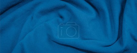 blue crinkled cotton fabric. background or textura