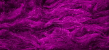 Foto de Lana mineral violeta con una textura visible - Imagen libre de derechos