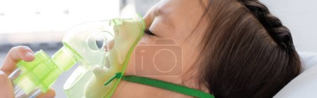 Photo for Kid using oxygen mask in hospital ward, banner - Royalty Free Image