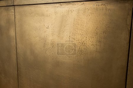 Foto de Close up of golden wall at reception in luxury hotel - Imagen libre de derechos