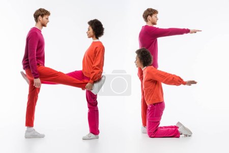 Photo for Side view of multiethnic couple in magenta color clothes showing he word with legs and hands on white background - Royalty Free Image