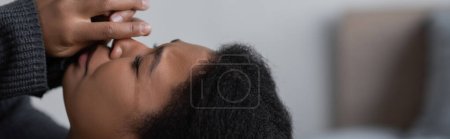 Photo for Heartbroken multiracial woman with psychological problem crying at home, banner - Royalty Free Image