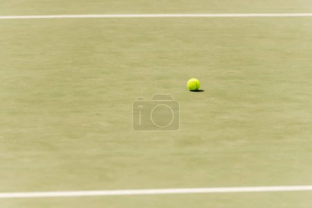 Photo for Nobody on shot, competitive sport, tennis ball on green grass, tennis court, motivation , hobby - Royalty Free Image