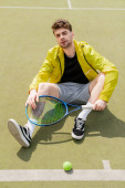 handsome man sitting on tennis court, male tennis player with racket, active wear, sport Mouse Pad 665316214
