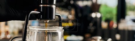 Photo for Partial view of barista brewing fresh espresso and regulating siphon coffee maker, banner - Royalty Free Image