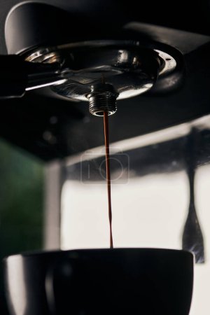 coffee extraction, arabica, black coffee, espresso dripping into cup,  professional coffee machine 