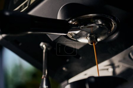 coffee extraction, black coffee, espresso dripping into cup,  professional coffee machine, cafe 