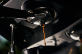 coffee extraction, black coffee, hot espresso dripping into cup, professional coffee machine  puzzle #666433776