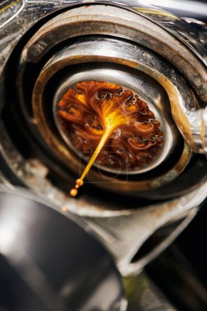 macro, black coffee, extraction, hot espresso dripping into cup, professional coffee machine 