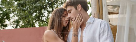 attractive woman touching cheek of boyfriend during summer vacation, before kiss moment, banner