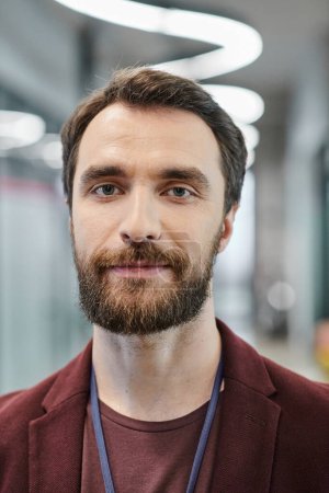 Photo for Portrait of confident bearded entrepreneur looking at camera in modern coworking office - Royalty Free Image